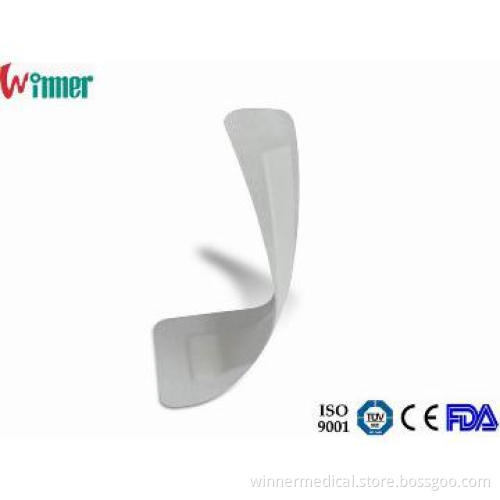 Nonwoven adhesive wound dressing